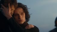 Jacaerys holding Viserys ll during Lucerys' funeral (Image via Max)